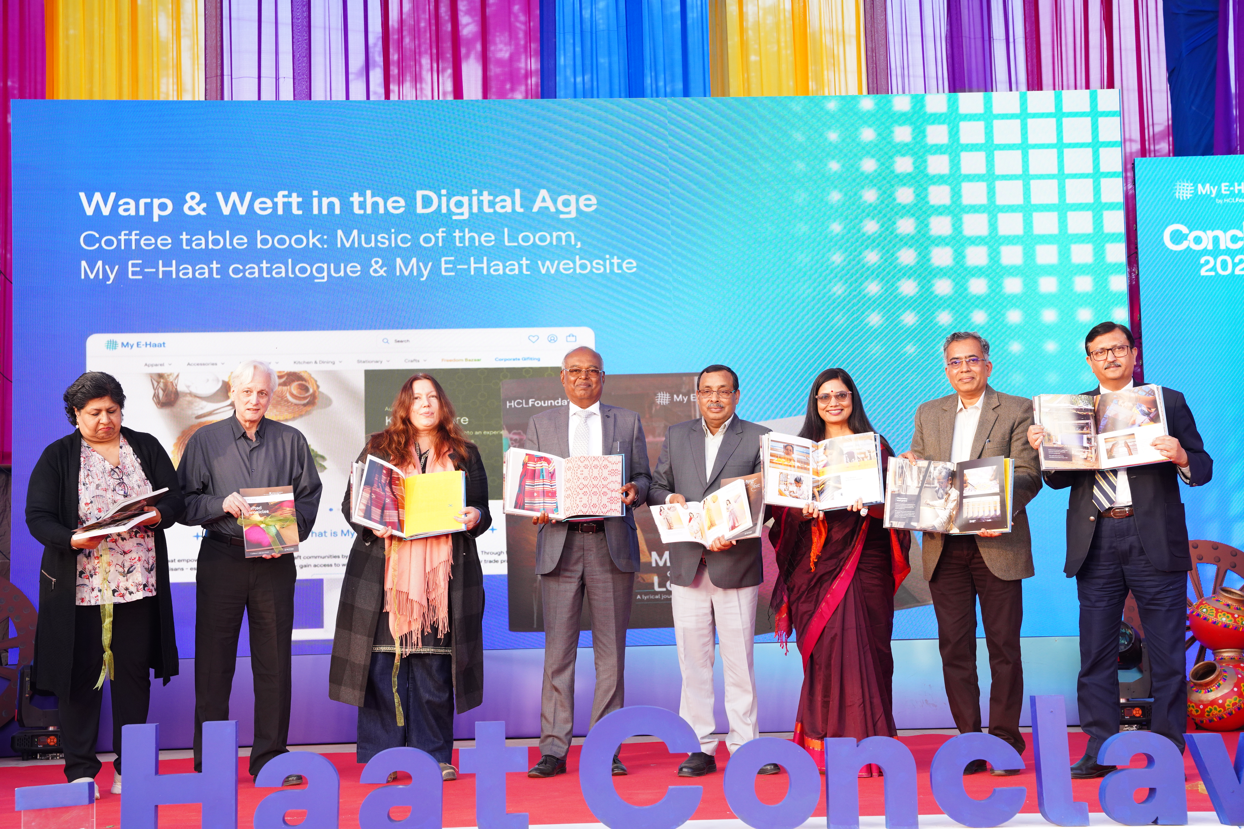 Launch of a coffee table book celebrating India’s rich handicraft tradition at HCLFoundation-hosted My E-Haat Conclave at Noida Haat in Noida, on December 12, 2025