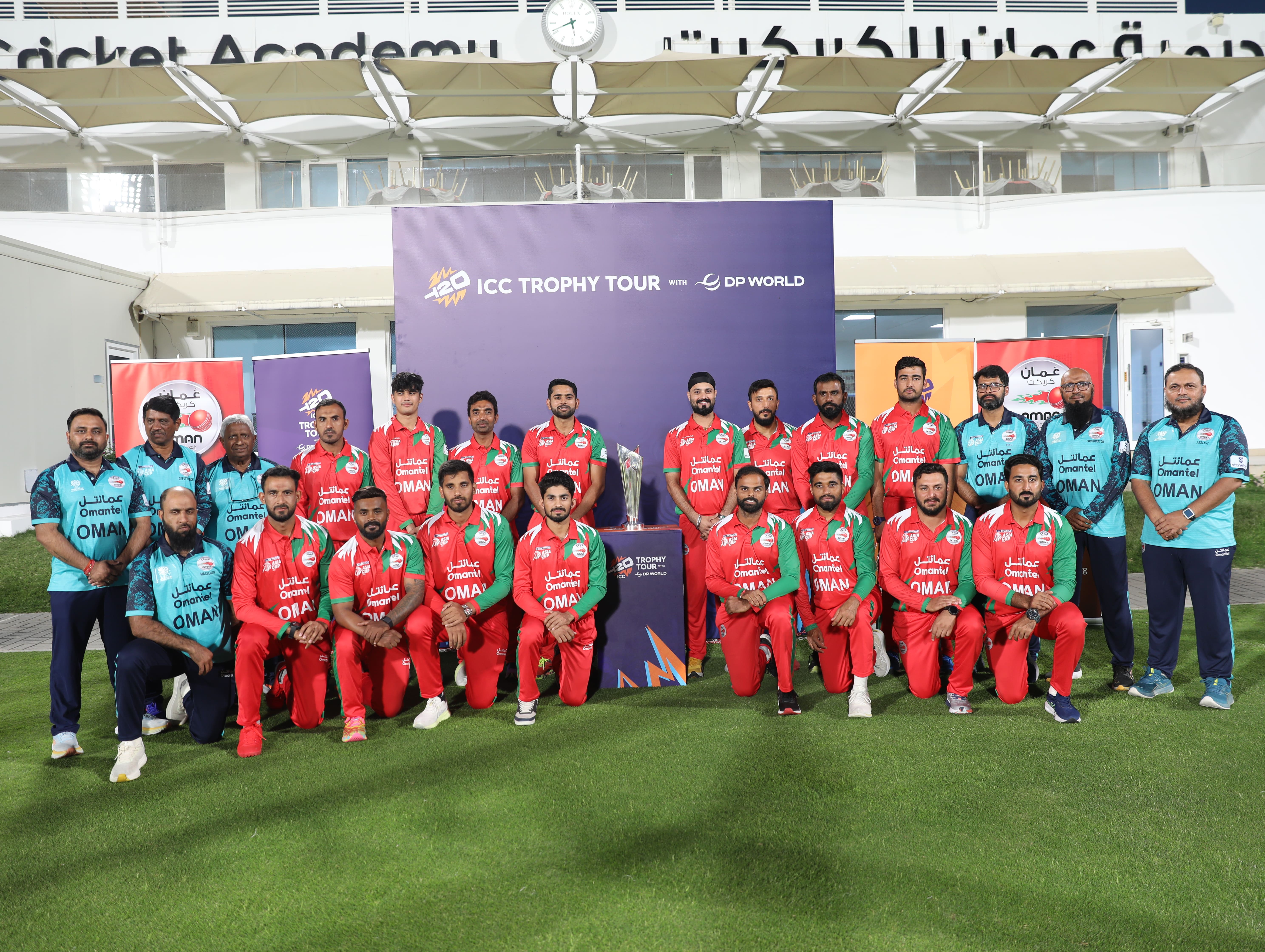 Oman Senior Men’s Cricket Team pose with the ICC Men’s T20 World Cup 2026 trophy at the Oman Cricket Academy during the Trophy Tour with DP World in Oman